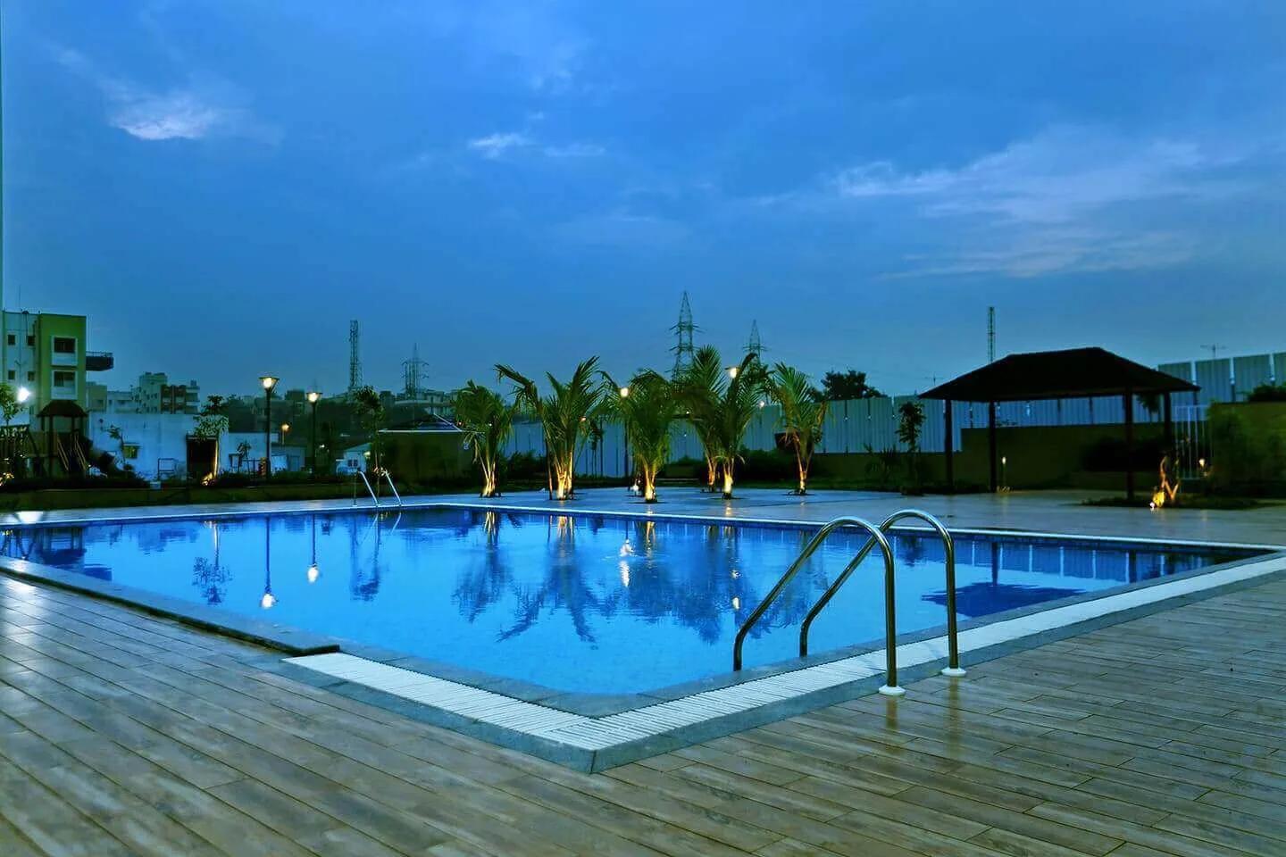 L Axis swimming pool at dusk, Moshi, Pune