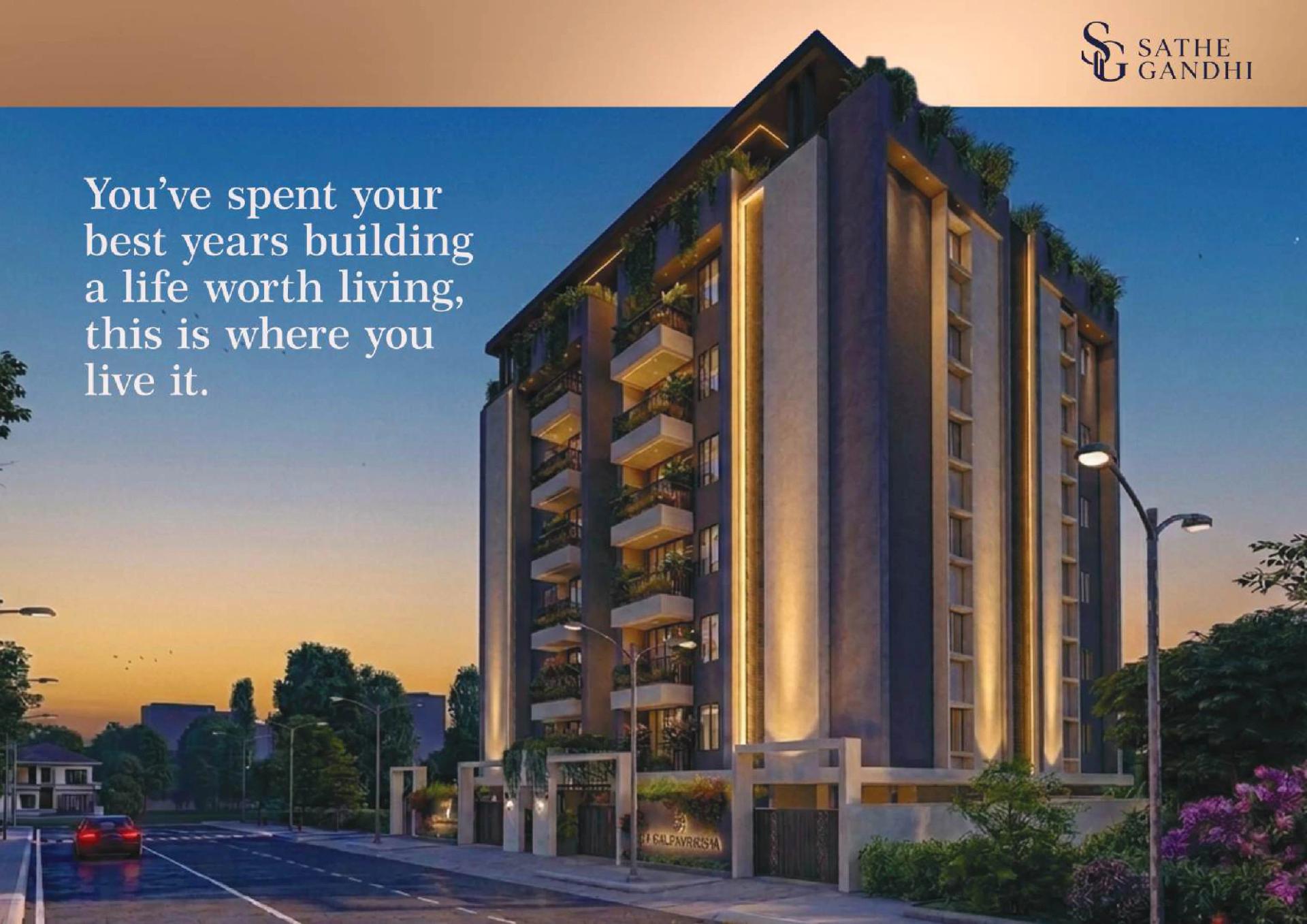 Building at dusk with street lights on a project banner at 24 Kalpavriksha, Baner