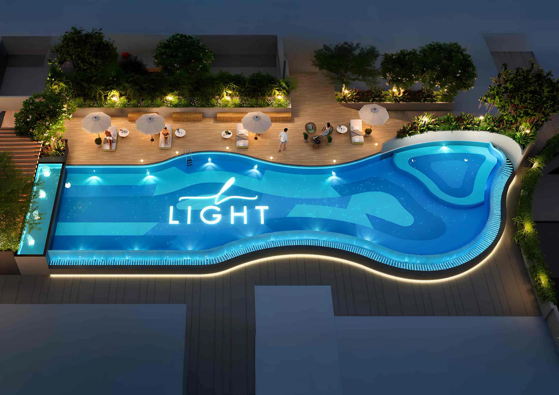Rooftop swimming pool with vanishing edge and pool deck at Codename Light, Keshav Nagar