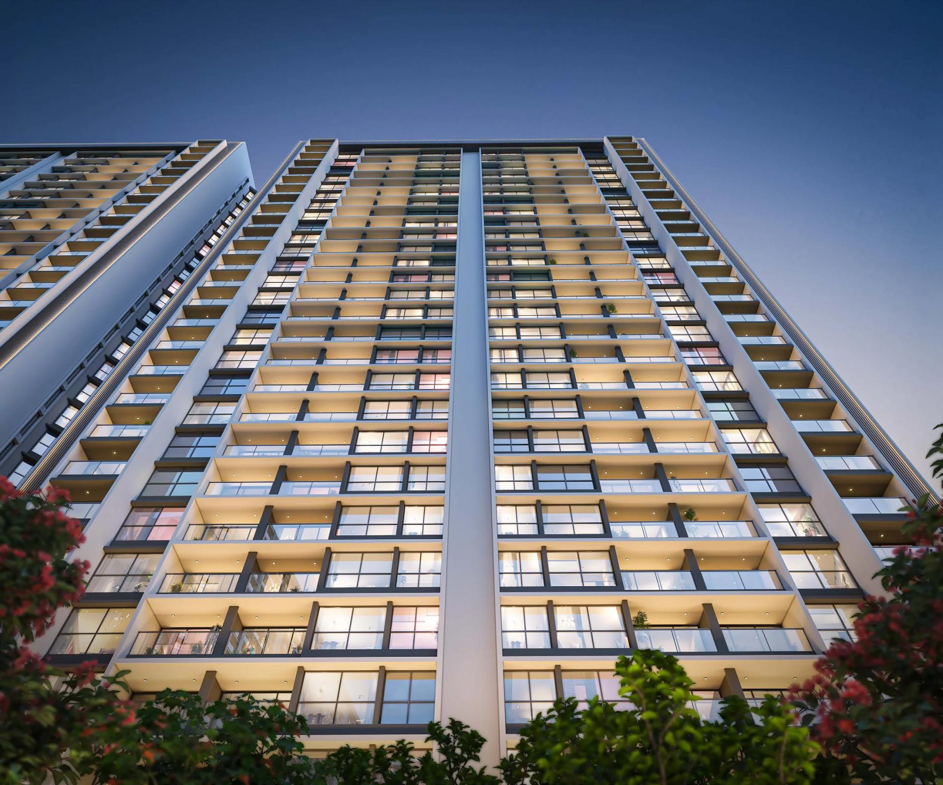 Tower facade with balconies seen from below at Mantra Melange, Kharadi