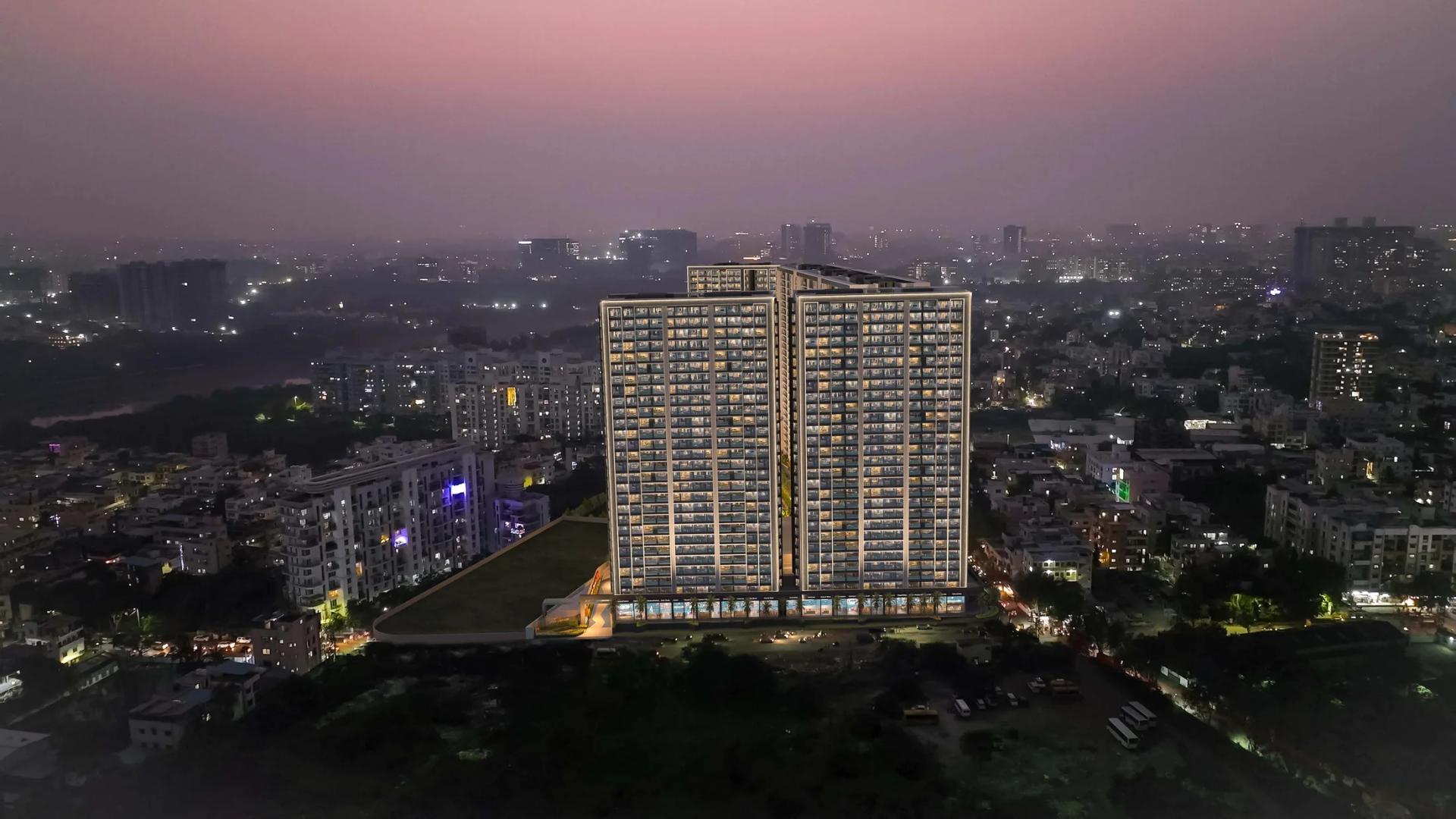 Aerial dusk view of the towers at Mantra Melange, Kharadi with the Pune skyline