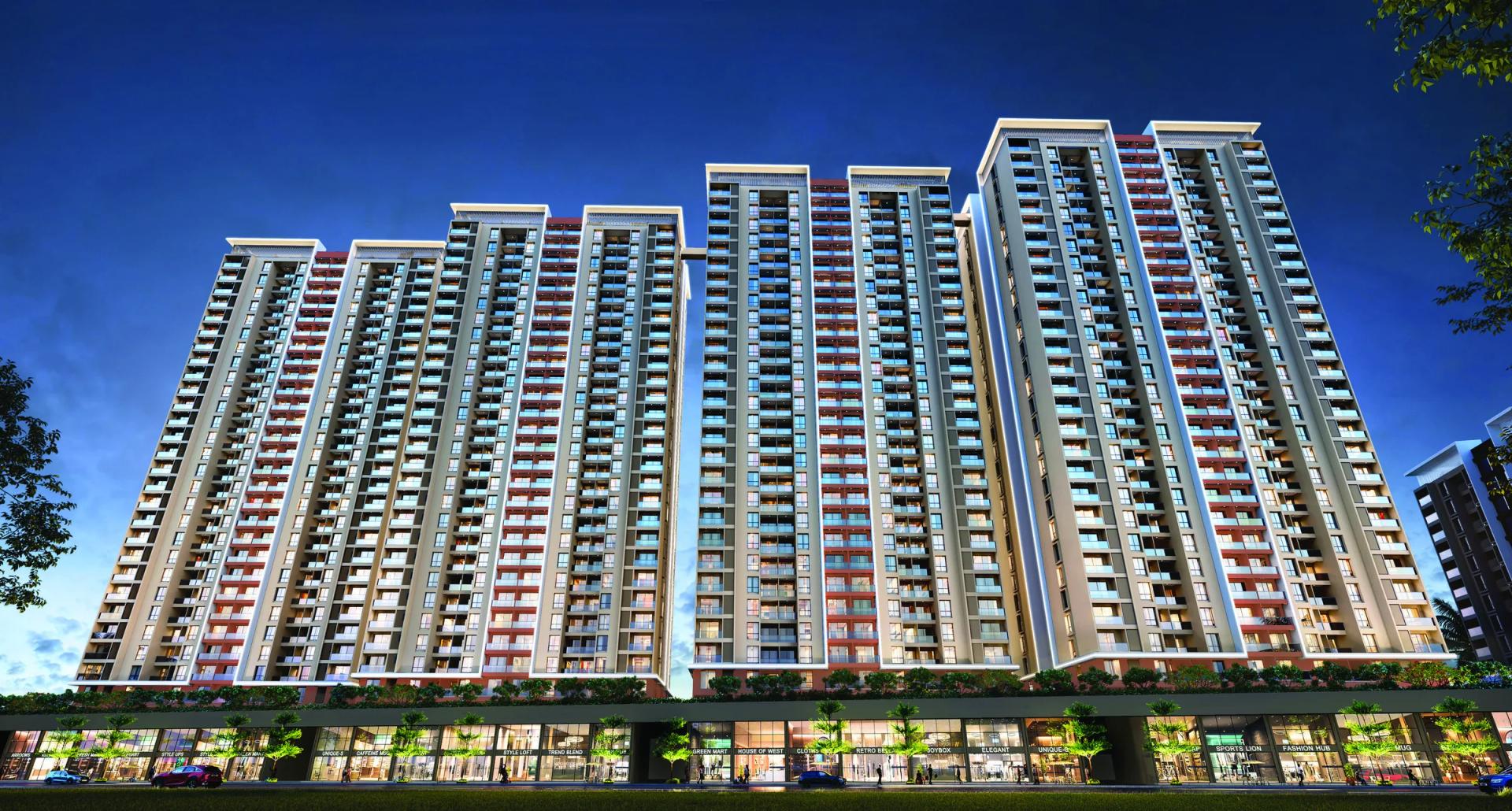 Mangalam Starview towers at dusk with ground-floor retail frontage (artist's impression)