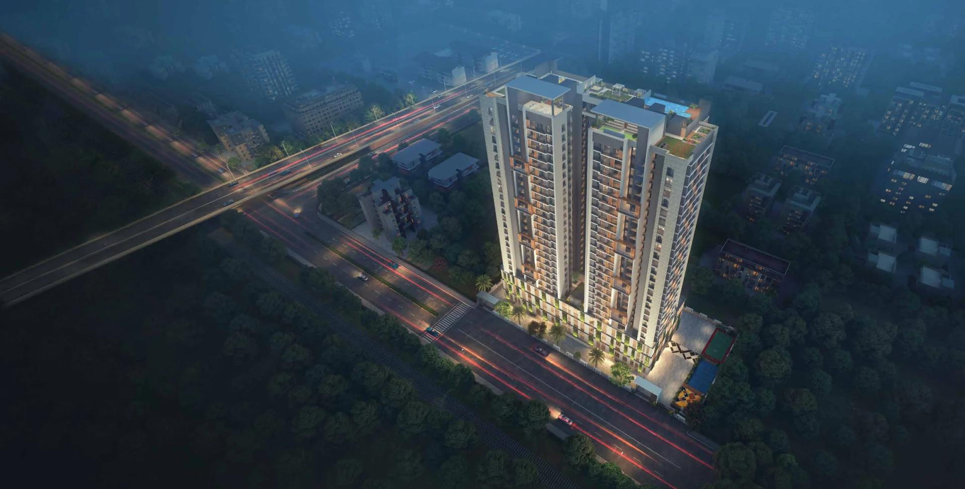 Aerial night view of Newton Homes Royale beside the Kharadi–Hadapsar bypass (artistic impression)