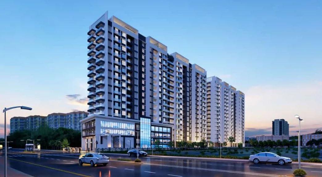 Sky World Wakad Pune, tower and podium shopfront seen from Pink City Road