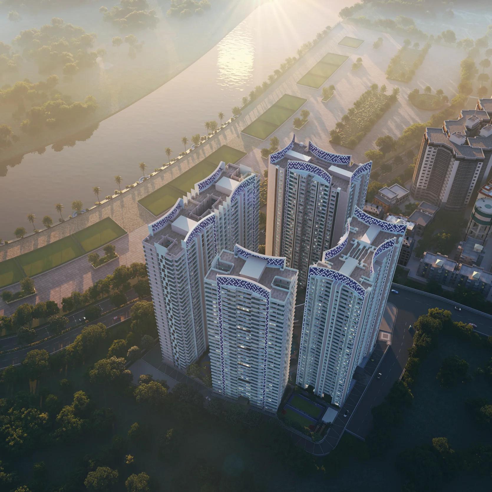 Aerial view of the five towers beside the river at Park Eden, Kharadi