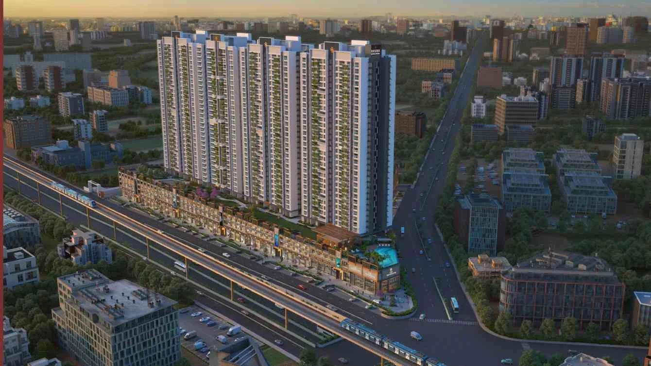 Aerial view of the tower and retail frontage along the metro line at dusk at Shubh Veda Commercial, Akurdi