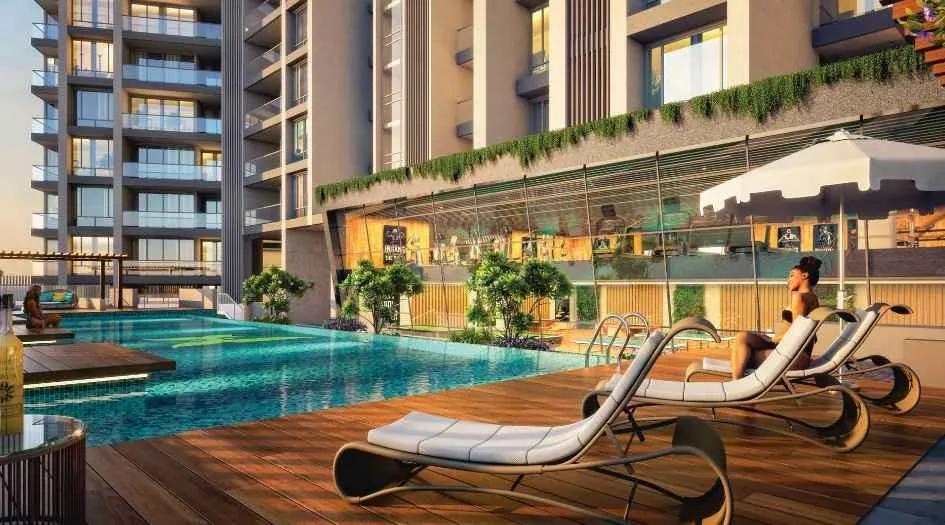 PK Hillcrest swimming pool deck with loungers, Pimple Saudagar